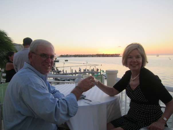 Mom and Dad toasting to how nice their life is. 